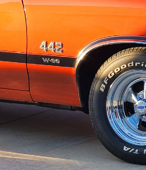 Orange classic car with 442 badge.